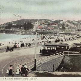 Electric tram travelling along Coogee Beach