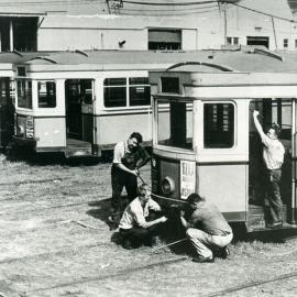Dismantling one of the last trams at the Randwick Tramway Workshops, early 1960s