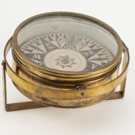 Brass compass on stand
