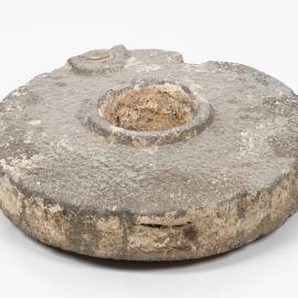 Millstone from the shipwreck of L'Astrolabe 