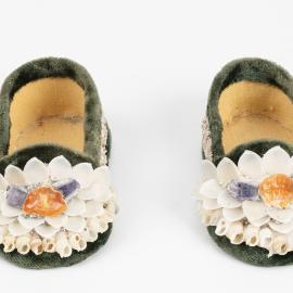Pair of green velvet shellwork baby shoes