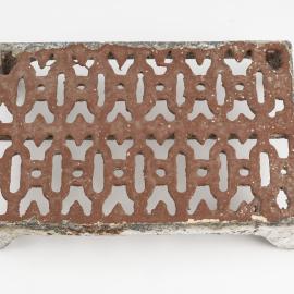 Ventilation grille with metal lace design from the Cable Station building