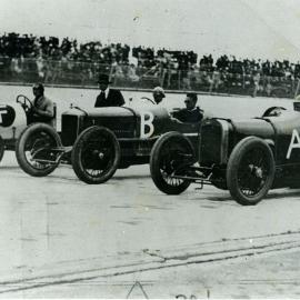 Race cars preparing to race
