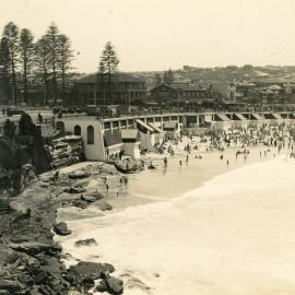 Coogee Beach facing Northing showing the dressing sheds and end of Coogee Pier