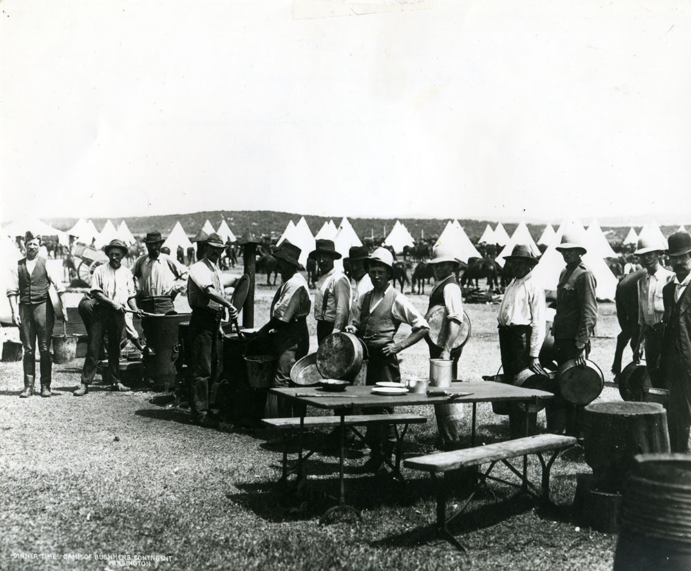 Dinner time for the Bushmen's Contingent at Kensington Racecourse. Boer War.