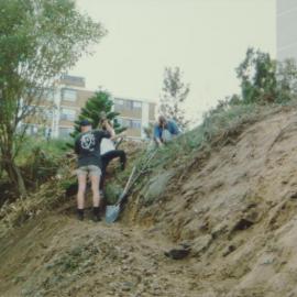 Clearing an embankment at Bligh Place, Randwick