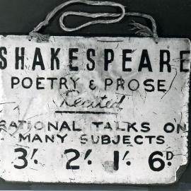 Photograph of the sign worn by Bea Miles