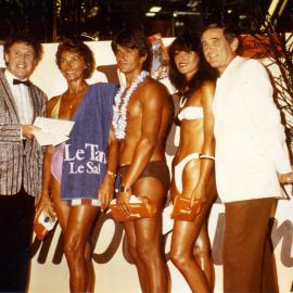 Contestants in a Show Your Tan competition at Stockland Mall, Maroubra