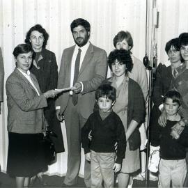 Mrs. Kevgas presents cheque to Dr. Berdoukas