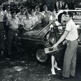 Soldiers from Randwick's 9th Transport Regiment with Miss Victoria, Jeneene Clarke