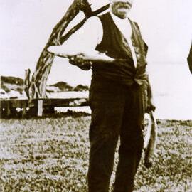 George Howe holding Mullet fish