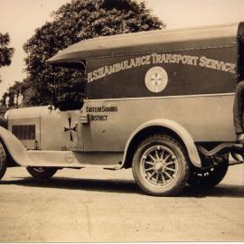Buick Ambulance with Paramedic standing beside it