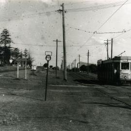 Tram on Anzac Parade at Storey Street Intersection