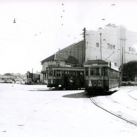 Two Trams at the Anzac Parade and Maroubra Road Intersection