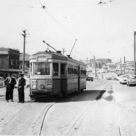 Staff in front of tram at Maroubra Beach Terminus