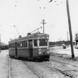 Tram crossing the tracks at Little Bay