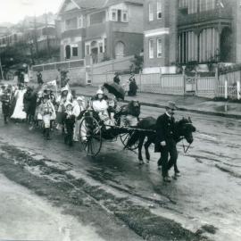 Patriotic procession of children during World War I.